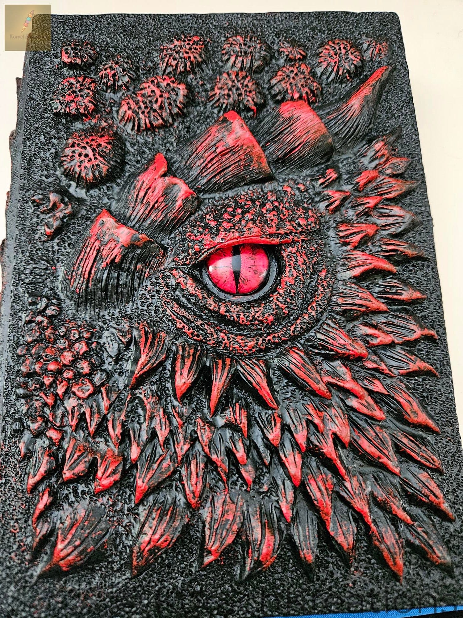 Dragon Eye Handcrafted Journal – Black & Red Sculpted Fantasy Notebook