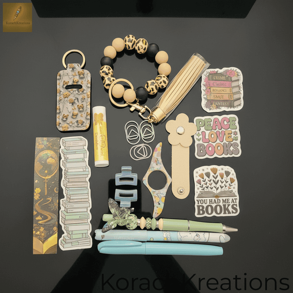 Overhead flat lay of accessory bundle neatly arranged on a sleek black desk with bright even lighting